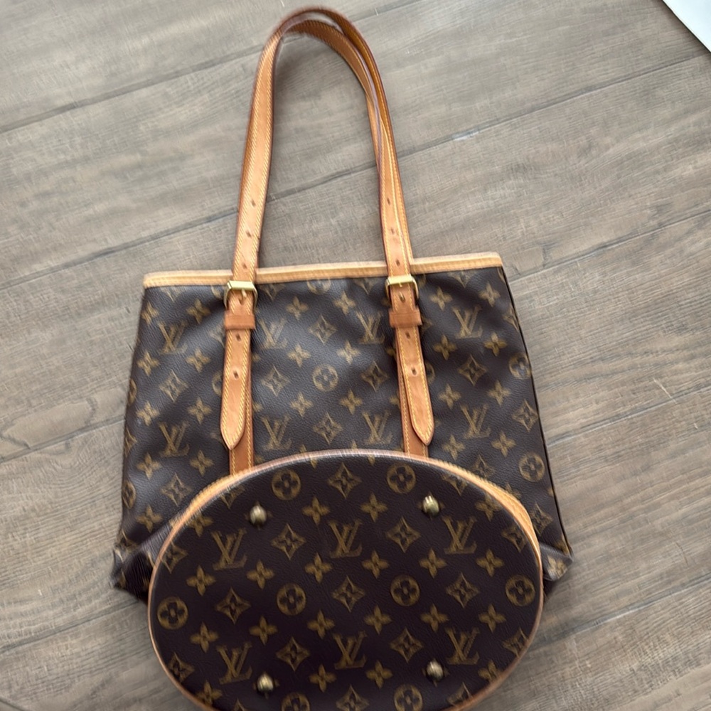 Louis Vuitton monogram bucket bag.